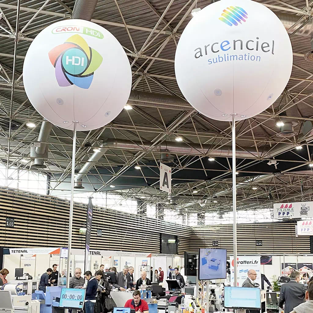 We invented these helium-free advertising balloons to optimize visibility at trade shows. These giant air-filled balloons reduce the cost of advertising on your booth.